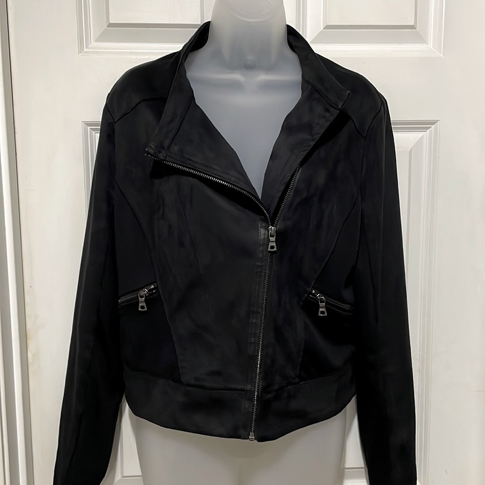 Women’s size large short black jacket  Once worn.
